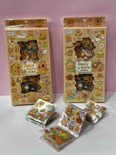 CAJA DE STICKERS POR 100 HOJASCAPIBARA