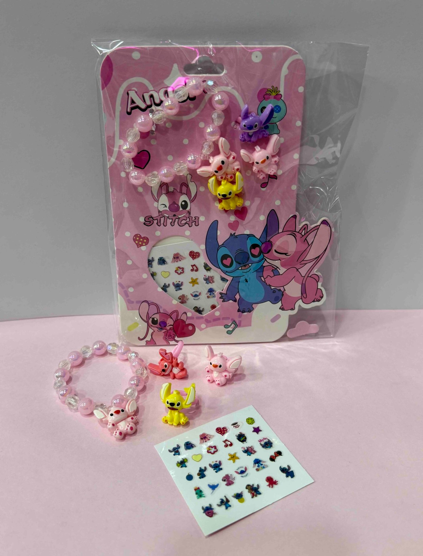 KIT PARA NIÑA STITCH (PULSERA,3 ANILLOS,STICKERS PARA UÑAS)